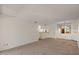 Unfurnished living room with carpet and wall-mounted mirror at 540 N May -- # 2148, Mesa, AZ 85201