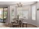 Cozy breakfast nook features natural lighting and seating for four at 7008 W Southgate Ave, Phoenix, AZ 85043