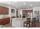 Gourmet kitchen features granite countertops and stainless steel appliances at 7008 W Southgate Ave, Phoenix, AZ 85043
