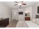 The main bedroom leads to the ensuite bathroom and walk-in closet creating a private retreat at 7008 W Southgate Ave, Phoenix, AZ 85043