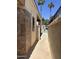 Outdoor shower with modern fixtures and tile backsplash located by the pool area at 7101 W Beardsley Rd # 422, Glendale, AZ 85308