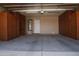 Spacious garage with built-in wood storage cabinets, providing ample space and organization at 7425 N 69Th Ln, Glendale, AZ 85303