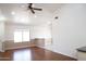 Bright living room featuring wood floors, neutral paint, and recessed lighting at 7425 N 69Th Ln, Glendale, AZ 85303