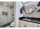Modern bathroom with white subway tile shower, black accents, and stylish vanity at 7557 N Dreamy Draw Dr # 139, Phoenix, AZ 85020