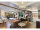 Open-concept living space with stylish kitchen and cozy living area with fireplace at 7557 N Dreamy Draw Dr # 139, Phoenix, AZ 85020