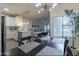 Open concept dining area with view of kitchen and living room at 9600 N 96Th St # 171, Scottsdale, AZ 85258