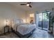 Bright bedroom with access to outdoor patio and walk-in closet at 9600 N 96Th St # 171, Scottsdale, AZ 85258