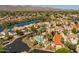 Beautiful aerial view of community with lush landscaping and mountain views at 10429 N 101St St, Scottsdale, AZ 85258