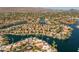 Beautiful aerial view of community with lakefront property and mountain views at 10429 N 101St St, Scottsdale, AZ 85258