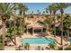 Community pool and gazebo with chairs for lounging at 10429 N 101St St, Scottsdale, AZ 85258