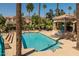 Community pool with chairs and gazebo at 10429 N 101St St, Scottsdale, AZ 85258