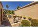 Outdoor kitchen area with built-in grill and seating at 10429 N 101St St, Scottsdale, AZ 85258