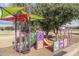 Fun playground area equipped with a slide, climbing wall, and interactive play panels at 10429 N 101St St, Scottsdale, AZ 85258