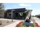 Modern building with stone accents and a contemporary sculpture in a beautifully landscaped setting at 10651 E Fernwood Ln, Scottsdale, AZ 85262