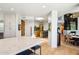 Bright kitchen with a spacious island and breakfast bar, modern appliances, and an open layout at 10651 E Fernwood Ln, Scottsdale, AZ 85262