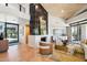 Bright and airy living room featuring a fireplace, high ceilings, and stylish modern decor at 10651 E Fernwood Ln, Scottsdale, AZ 85262