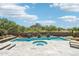 Stunning backyard pool and hot tub area with desert landscaping at 10651 E Fernwood Ln, Scottsdale, AZ 85262