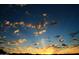 Beautiful sunset featuring orange clouds against a deep blue sky, creating a serene desert vista at 10651 E Fernwood Ln, Scottsdale, AZ 85262