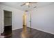 Bedroom with hardwood floors, neutral walls, and a ceiling fan at 10925 E Toluca Ave, Mesa, AZ 85212