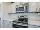 Close-up of oven range in kitchen at 10925 E Toluca Ave, Mesa, AZ 85212