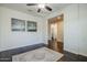 Bright living room features artwork and access to additional spaces at 10925 E Toluca Ave, Mesa, AZ 85212