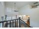 Open living area with soaring ceilings offers an aerial view of kitchen and living space at 10925 E Toluca Ave, Mesa, AZ 85212