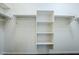 Walk-in closet with built-in shelving at 10925 E Toluca Ave, Mesa, AZ 85212
