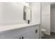 Bathroom features a white vanity with black hardware and a modern sink and faucet at 11000 N 91St Ave # 20, Peoria, AZ 85345