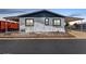 Charming single-story home featuring a carport and low-maintenance landscaping at 11000 N 91St Ave # 20, Peoria, AZ 85345