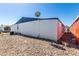 Exterior of a home showing gravel landscaping, AC unit, and satelite dish at 11000 N 91St Ave # 20, Peoria, AZ 85345