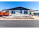 Exterior shot of a home featuring gray roofing and desert landscaping at 11000 N 91St Ave # 20, Peoria, AZ 85345