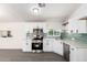 Modern kitchen featuring stainless appliances, white cabinets, and stylish backsplash at 11000 N 91St Ave # 20, Peoria, AZ 85345