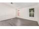 Inviting living room with luxury vinyl plank flooring and large windows for natural light at 11000 N 91St Ave # 20, Peoria, AZ 85345