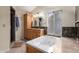 Luxurious bathroom featuring a shower, soaking tub, double sinks, and ample vanity storage at 11085 E Mary Katherine Dr, Scottsdale, AZ 85259