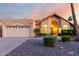 Inviting single-Gathering home features a well-manicured yard and charming desert landscaping at 11085 E Mary Katherine Dr, Scottsdale, AZ 85259