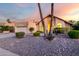 Inviting single-Gathering home features a well-manicured yard and charming desert landscaping at 11085 E Mary Katherine Dr, Scottsdale, AZ 85259