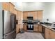 Well-equipped kitchen with stainless steel appliances and ample cabinet space at 11085 E Mary Katherine Dr, Scottsdale, AZ 85259