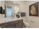 Modern bathroom with a stylish vanity, sleek fixtures, and tasteful decor, offering a luxurious and functional space at 11300 N Casa Dega Dr # 1005, Surprise, AZ 85388