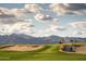 Picturesque golf course landscape with sand traps and mountain views at 11300 N Casa Dega Dr # 1005, Surprise, AZ 85388
