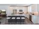 Gourmet kitchen boasts an island with seating and state-of-the-art stainless steel appliances at 11300 N Casa Dega Dr # 1005, Surprise, AZ 85388
