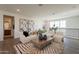 Relaxing loft-style living room with stylish decor, modern furniture and natural light at 11300 N Casa Dega Dr # 1005, Surprise, AZ 85388
