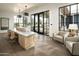 Well-lit and spacious lobby area featuring a reception desk, comfortable seating, and bright windows at 11300 N Casa Dega Dr # 1005, Surprise, AZ 85388