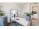 Bright and airy office space with a minimalist white desk, comfortable seating, and stylish decor for a serene workspace at 11300 N Casa Dega Dr # 1005, Surprise, AZ 85388
