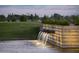 Unique water feature with stone accents and serene water flow in a Primary-planned community at 11300 N Casa Dega Dr # 1005, Surprise, AZ 85388