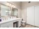 Bathroom featuring double vanity, modern fixtures, and glass enclosed shower at 11669 W Pine Mountain Ct, Surprise, AZ 85378