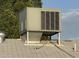 Rooftop air conditioner with a gray metal housing and visible components at 1428 S Palo Verde Dr, Apache Junction, AZ 85120