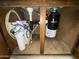 Plumbing and water filtration system under the kitchen sink at 1428 S Palo Verde Dr, Apache Junction, AZ 85120