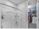 Bright bathroom with shower and view to walk-in closet at 17178 W Buchanan St, Goodyear, AZ 85338