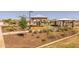 Scenic community park featuring shaded playground, picnic area, and well-maintained landscaping at 17178 W Buchanan St, Goodyear, AZ 85338