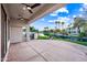 Large covered patio with dual ceiling fans and waterfront view at 1724 W Blue Ridge Way, Chandler, AZ 85248
